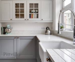 Grey country kitchen with stone worktop